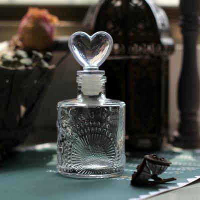 China Diffuser Glass Bottles Empty High Quality Embossed Perfume Oil Nordic Style Diffuser Bottle Patterned Glass Wholesale for sale