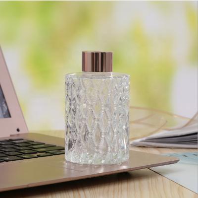 China Diffuser Glass Bottles High Quality Round 100ml Empty Geo Reed Perfume Diffuser Glass Decorative Bottles for sale