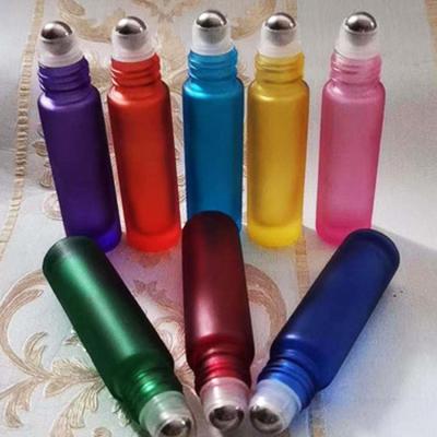 China Personal Care 10ml Rose Blue Multicolor Matte Perfume Glass Roller Bottle Matte Gold Lid Cosmetic Roll On Bottle for sale