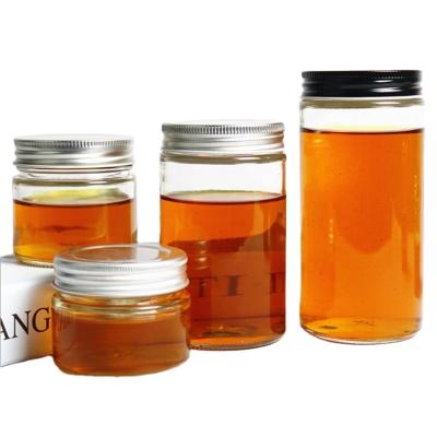 China Canned Food Round 150ml 200ml 250ml 300ml 380ml 500ml 16oz 8oz Empty Glass Honey Cake Storage Jar Containers With Lids for sale