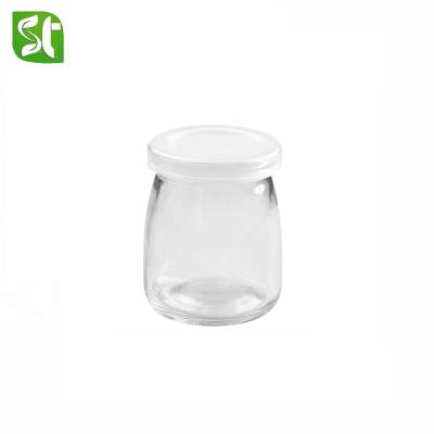 China Wholesale 100ml 200ml Pudding Milk Glass Bottle Heatable Yogurt Bottle With Plastic Lid for sale