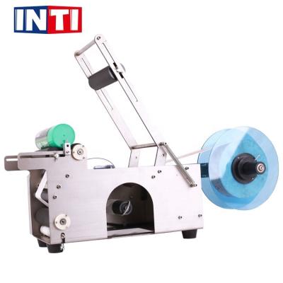 China Semi Automatic Food Stainless Steel Jar Round Bottle Tube Labeling Machine Plastic Glass Metal Label Sticking Packing Machine for sale