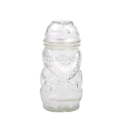 China Sustainable Bear Shape Decorative Glass Jar With Clip Lid Airtight Glass Jar for sale