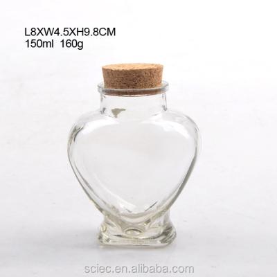 China Decorative Small Size Glass Beverage Jar Set Heart Shape Jar With Cork Lid for sale