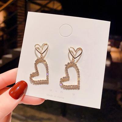 China Environmental Friendly Korea Earrings 2021 New Trendy Diamond Double Heart Fashion Women's Personalized Earrings for sale