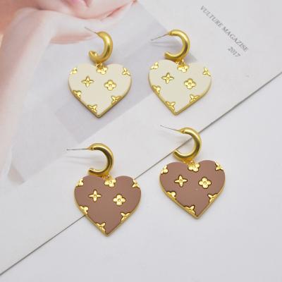 China Environmental Friendly Light Luxury Premium Heart Shaped Leather Flower Earrings Exaggerated Retro Love Earrings for sale