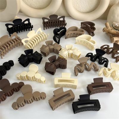 China Women's Hair Accessories 2021 Women's Hair Accessories Brown Hairgrips Hollow Hair clip Irregular Acrylic Matte Frosted Hair claw for sale