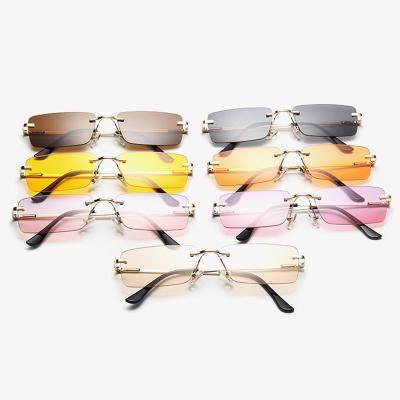 China High Quality Small Fashion Women Rimless Metal Frame Cheap Sunglasses NX16050 Fashion Sunglasses With Case for sale