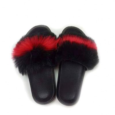 China Fashion trend wholesale custom fashion fluffy indoor premium comfortable winter all women fur slippers fluffy volume for sale