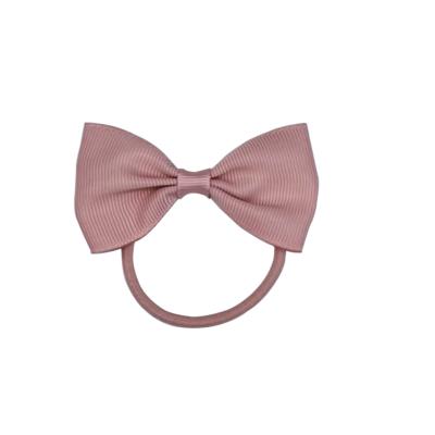 China UK factory sales fashion bow tie elastic hair tie elastic band children hair accessories kids style for sale