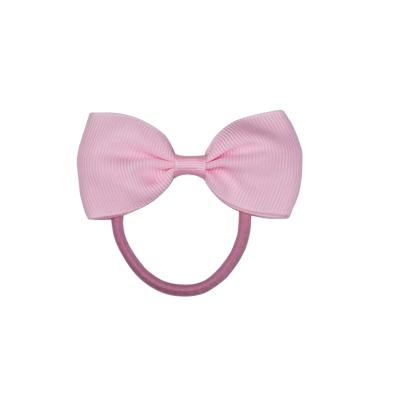 China Fashion pinkish bow tie elastic hair tie elastic band kids style children hair accessories UK factory sales for sale