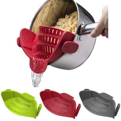 China Viable Hot Sale Kitchen Gadgets Heat Resistant Fits All Pots And Bowls Silicone Tension Strainer Clip On Strainer for sale