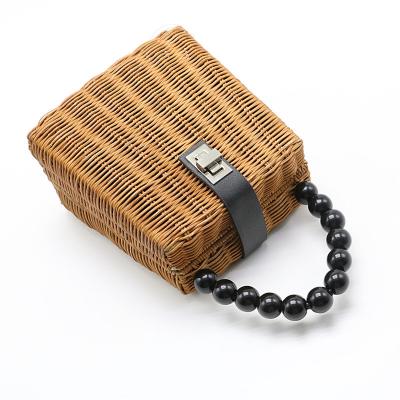 China 2019 New Retro Fashion Straw Bag Rattan Bag Beaded Ins Bag Seaside Vacation Portable Small Square Wild Beach for sale