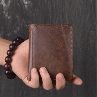 China Dating Mens Wallet Layer Cowhide Oil Leather Wax First Wallet Shorts RFID Leather Credit Card Case for sale