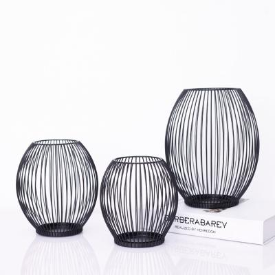 China Decorative Black Wire Mesh Candle Stand Holder Home Unique Round Wedding Lanterns Decoration Iron Candle Holders for sale