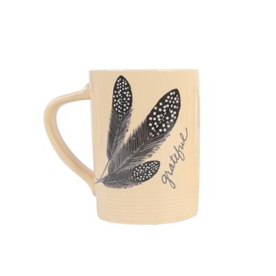 China New Design Viable Custom Creative Plain Matte Ceramic Porcelain Feather Decal Yellow Mugs Goods Using Cheap Price for sale