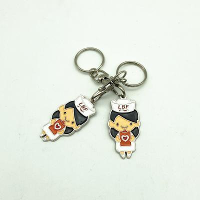 China Promotional Soft Metal Free Custom Souvenir Metal Enamel Shape Logo Design Design Factory Gifts Key Chain For Nurse for sale