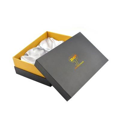 China Handmade Custom Hot Stamping LOGO With Lid And Satin Insert Shoulder Paper Boxes Black Gift Box for sale