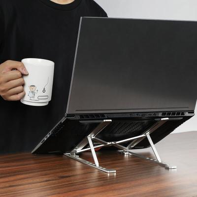 China Adjustable (Size) Quickly Fold Carry Conveniently Notebook Bracket Computer Notebook Tablet Laptop Stand for sale