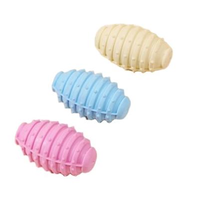 China Stocked Safe Non-Toxic TPR Pet Rugby Playing Dog Chew Toys for sale