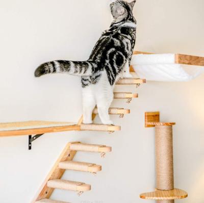 China Stocked Cat Climbing Frame Wall Hanging String Cat Stairs Wall Post Solid Wood Cat Toy for sale