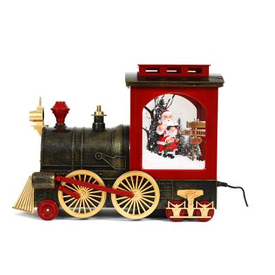 China Eco-friendly Electric Train Christmas Plays Warm Light Of Led Christmas Indoor Snowfall Music Playing Twinkle Lantern for sale