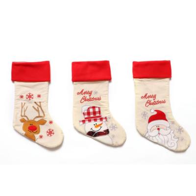 China Eco - Friendly Christmas Decoration Supplies Wholesale Christmas Gifts Christmas Stocking Bags Snowman Santa Claus Reindeer for sale