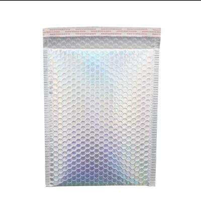 China Water proof and shakeproof hot spot bubble bag customized size rainbow laser aluminized film padded bubble mailer envelopes for sale