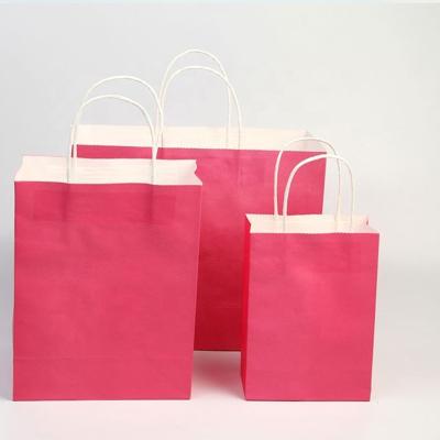 China Wholesale Recyclable Pink Color Gift Casual Style Handle Paper Bag Fashion Wrapping Paper Shopping Bag for sale