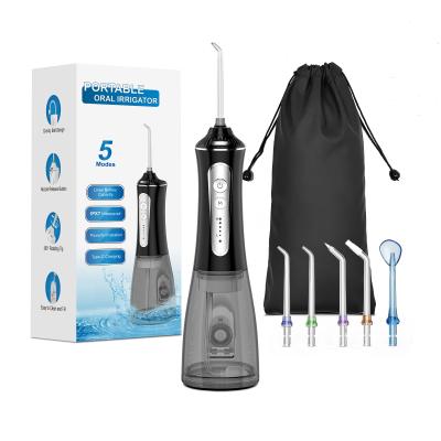 China Flosser de agua sin cable Irrigador oral IPX7 impermeable Cuidado oral 300ml Limpiador de dientes en venta