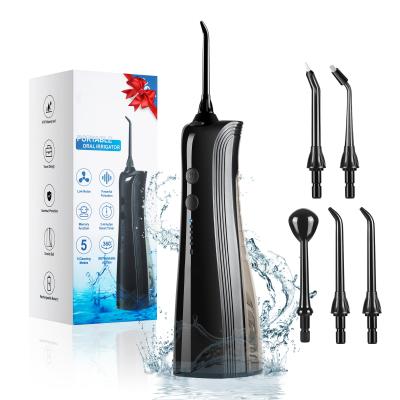 China IPX7 Impermeável Flosser de água de alta pressão Irrigador oral Limpeza de dentes com bicos múltiplos à venda