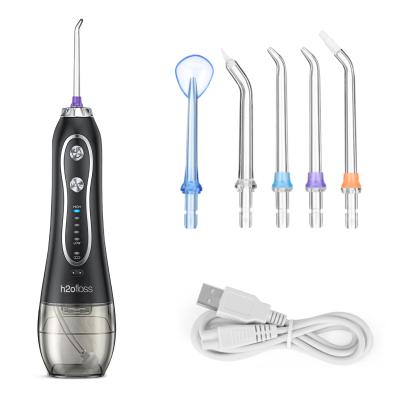 China CE Home Water Flosser Irrigador oral inalámbrico IPX7 Cable de carga USB de grado a prueba de agua en venta