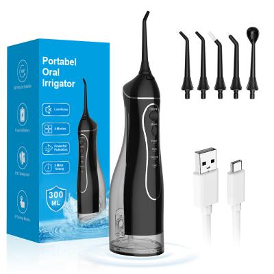 China Limpieza de dientes con agua Flosser eléctrico sin cable Ipx7 impermeable Irrigador oral con agua Floss Pick Flosser para dientes en venta