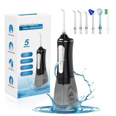 China 300 ml Water Tank Capacity Portable Cordless Rechargeable Oral Water Flosser for Tartar Removal and Teeth Whitening for sale