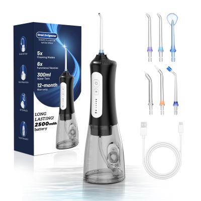 China Flosser de agua de 300 ml Electric portátil ABS palillos de dientes en venta