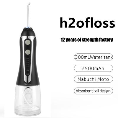 中国 コードレス再充電可能な携帯用超音波水Flosser 販売のため