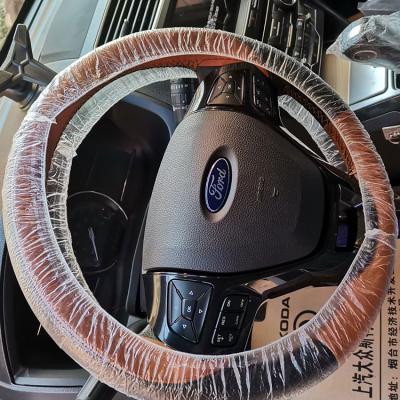 China All kinds of styling high quality clear car plastic sheet disposable transparent steering wheel cover for sale