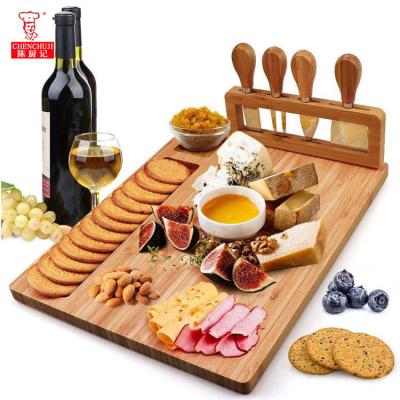 China Stocked Natural Chenchuji Cheese Board Cheese Tools Cheese Fork Bamboo Knife Set With Cutting Board for sale