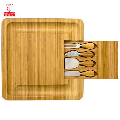 China Natural Bamboo Stocked Chenchuji Cheese Board Cutting Board with Cutlery Tray Plate Set for sale