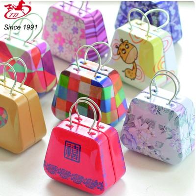 China Package mini-handbag shaped metal tin box with handle, custom boxes for mint for sale