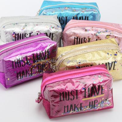 China Universal Glitter Cosmetic Handbag Water Splash Quicksand PVC Bag Transparent Wash Bag Korean Version for sale