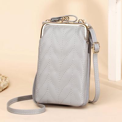 China Cross the latest fasion \ version 2021 Korean new mini long bag vertical wallet shoulder small body bag female mobile phone bag for sale