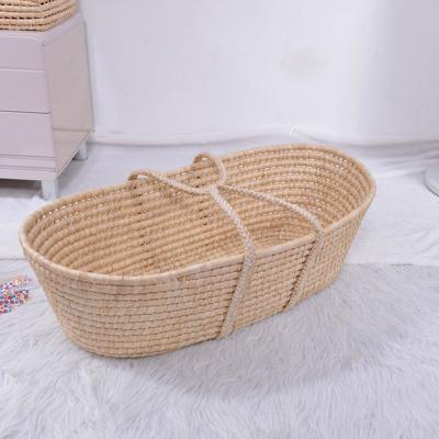 China Wholesale Handmade Corn Husk Basket Carrier Baby Sleep Hutch Moses Basket Bassinet for sale