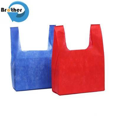 China Logo Print 100% PP Nonwoven Fabric Raw Material for Non Woven Shopping Bags T-Shirt Bags W-Cut Bags Vest Bags à venda