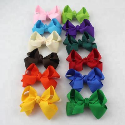 China Best Quality Curly Ribbon Kids Hair Bow Christmas Ribbon Hair Bows With Clip for sale