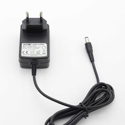 China High Quality LED Light Professional Made Durable 12V 2A AC DC Black Plug Charger Power Adapters for sale