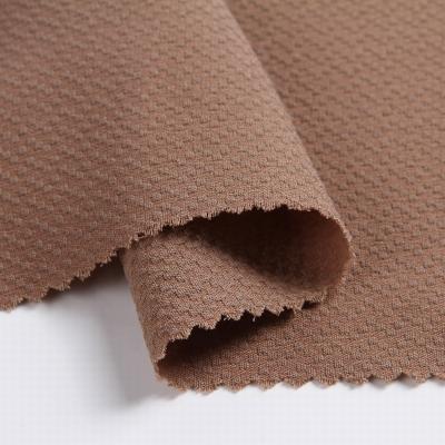 China Stretch TSP Apparel Fabrics Jacquard Polyester Stretch Fabric Lightweight Plain Dye Woven Custom For Pants Or Dress for sale