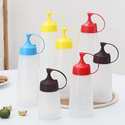 China Colorful Korean Style PE Plastic Sauce/Jam Squeeze Multi-size Extrusion Salad Bottle With Lid for sale