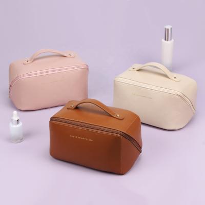 China New Arrival Fashion Travel Large Capacity Soft PU Cosmetic Bag Waterproof Toiletry Pouch For Women for sale