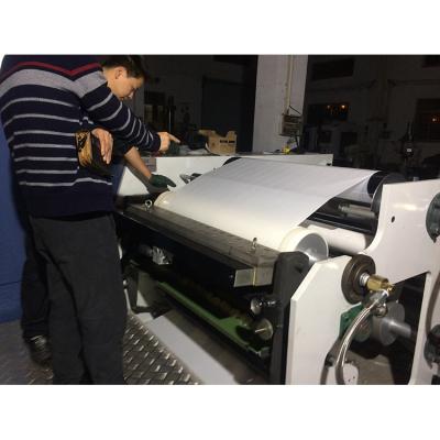 China CLOTHING Lowest Price Non Scratching Hot Neutral Melt Coating Machine Labels Mounting Paper for sale